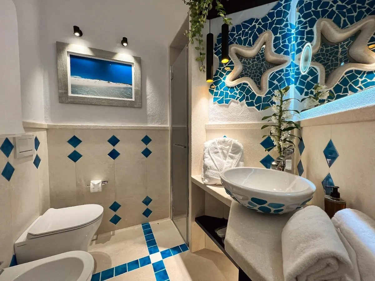 Suite Villa Corallo Rosso Porto Pino Apart Otel